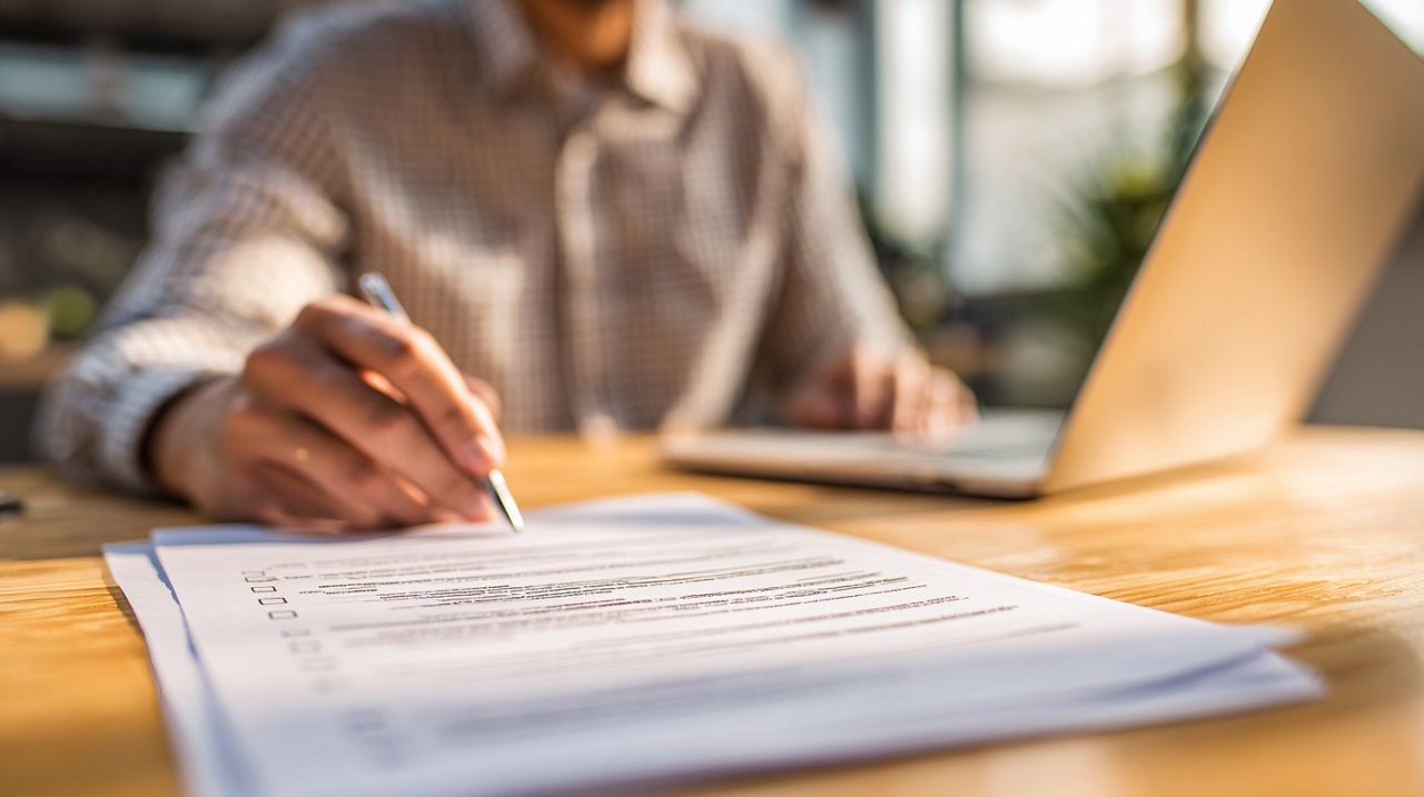 Person reviewing provider credentials for document translation project