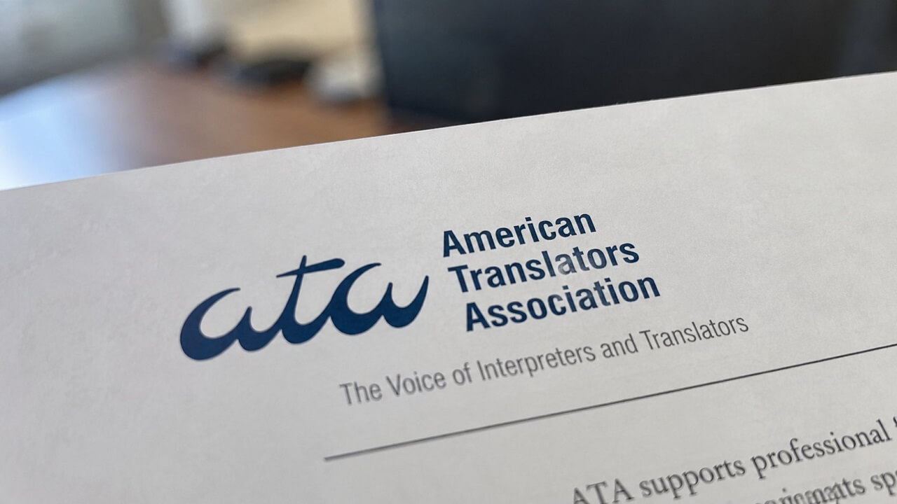 Close-up of American Translators Association branding printed on a professional document